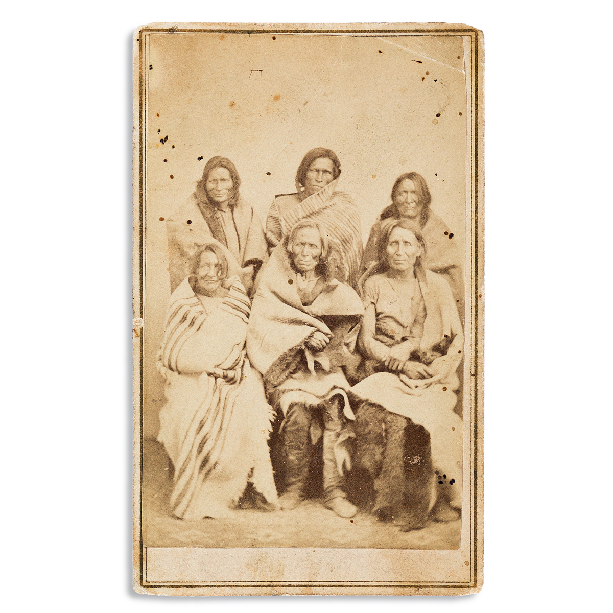 (AMERICAN INDIANS--PHOTOGRAPHS.) Nicholas Brown. Carte-de-visite of a group of 6 Taos Puebloans, printed in Mexico.